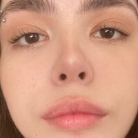 Adult webcam host pantyless at Stripchat