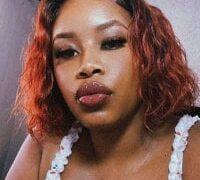 Adult webcam host MimiCurves at Stripchat